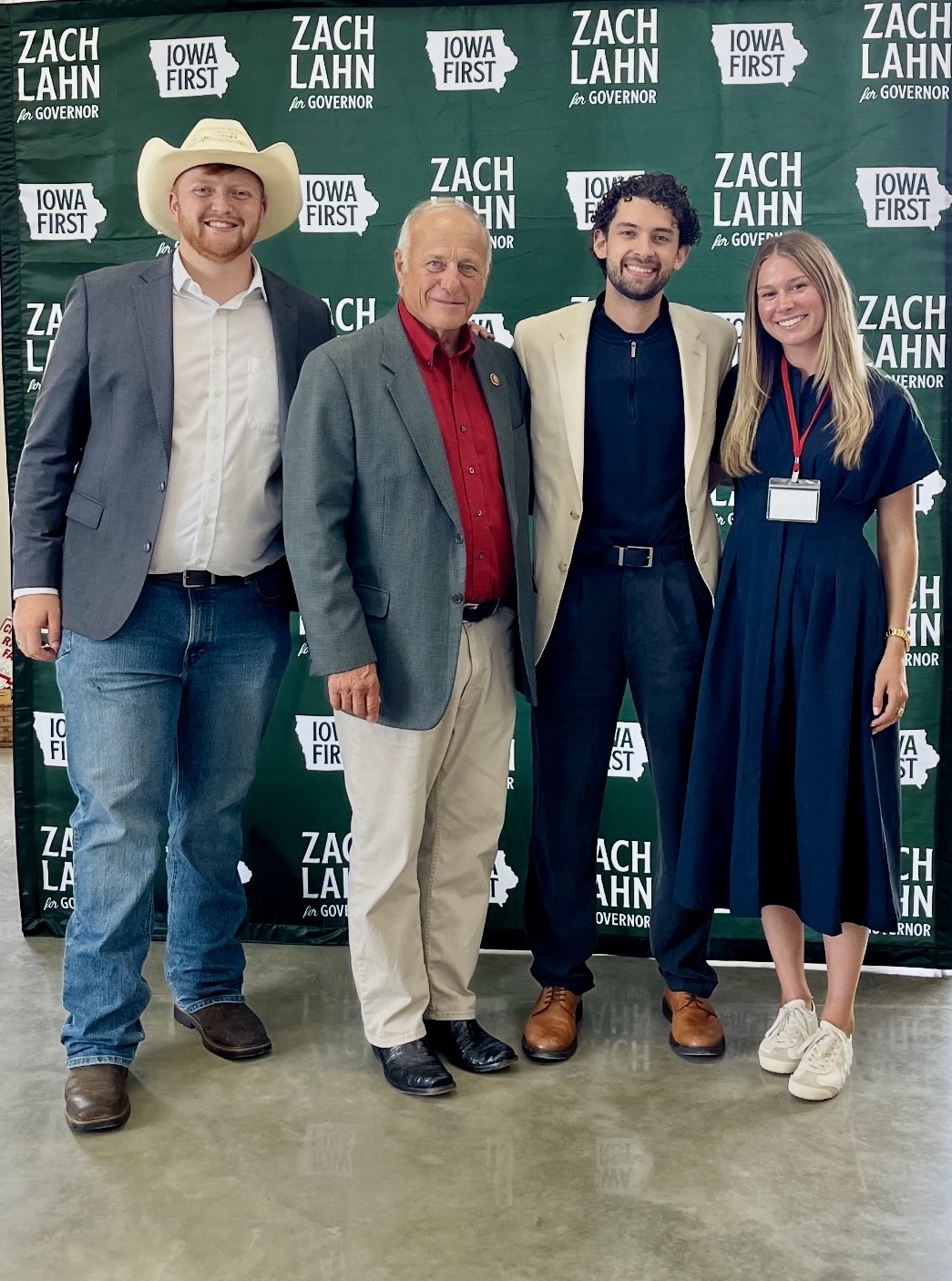 Ainsley Erzen with Zach Lahn and guests at an Iowa campaign event